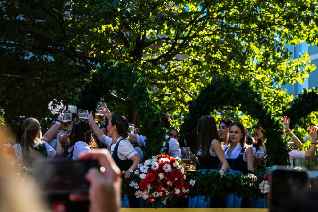 The famous Oktoberfest: people cheers with German wheat beer.